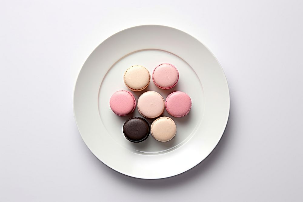 Macarons plate food confectionery. AI generated Image by rawpixel.