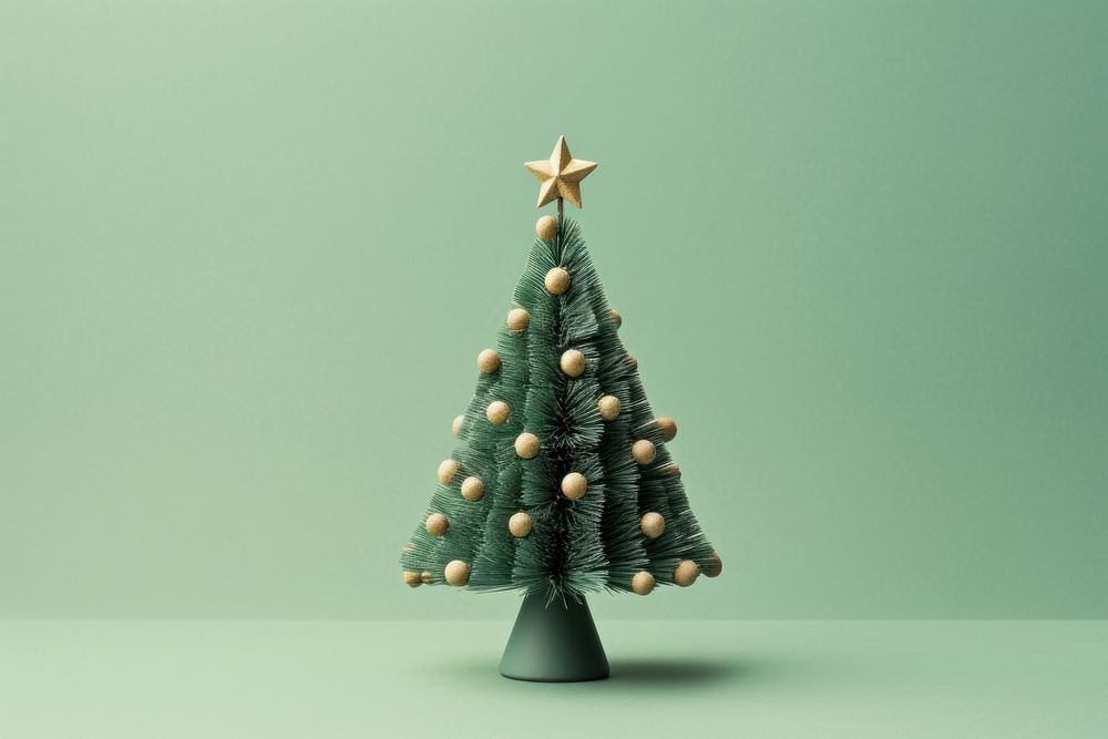 A mini christmas tree plant green illuminated. AI generated Image by rawpixel.