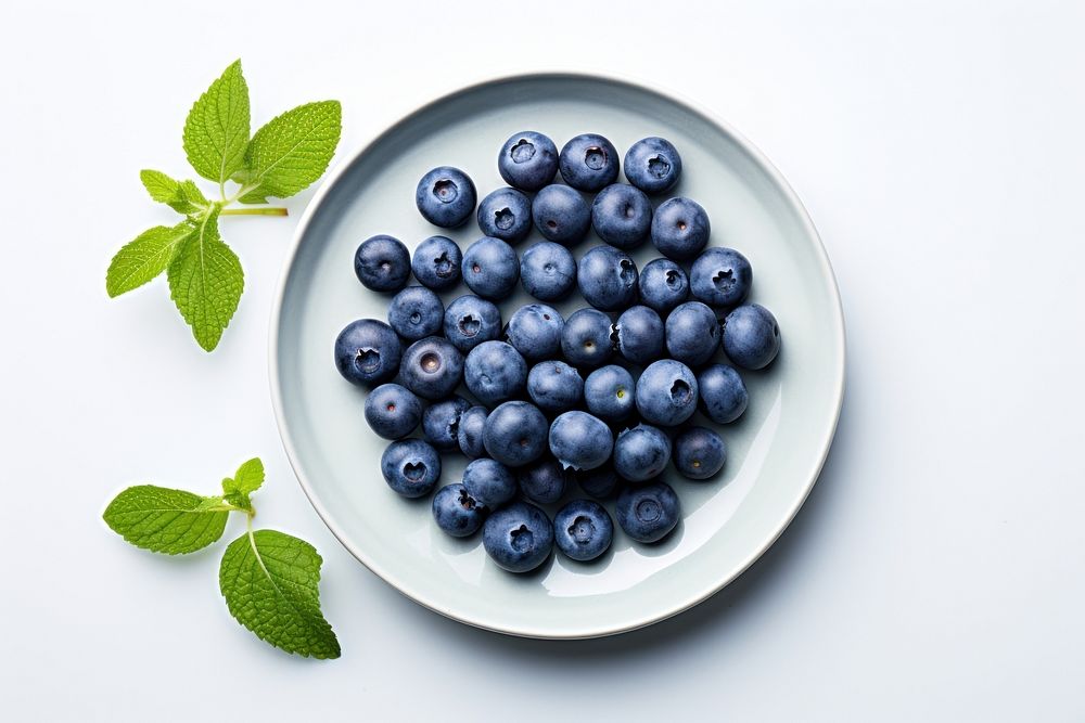 Blue berries fruit plate blueberry. AI generated Image by rawpixel.