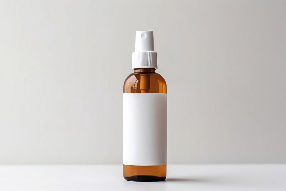 Amber Pump Spray Bottle bottle perfume white background. AI generated Image by rawpixel.