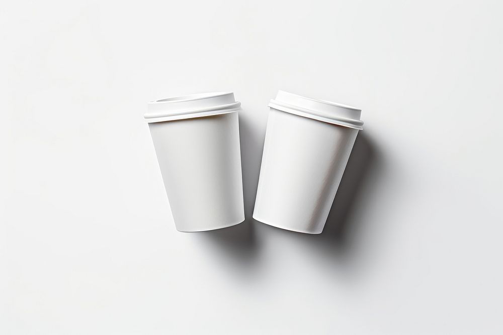 Floating Dual Paper Coffee Cup cup coffee white. AI generated Image by rawpixel.