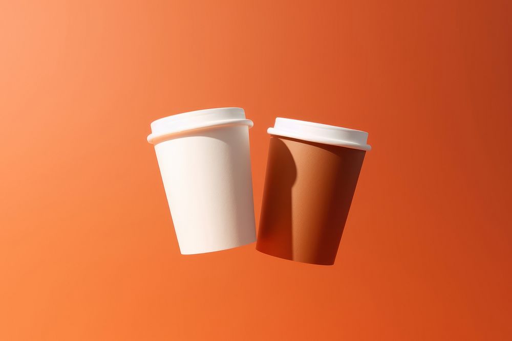 Floating Dual Paper Coffee Cup coffee cup mug. AI generated Image by rawpixel.