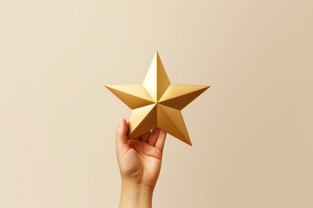 Golden star christmas hand celebration. AI generated Image by rawpixel.