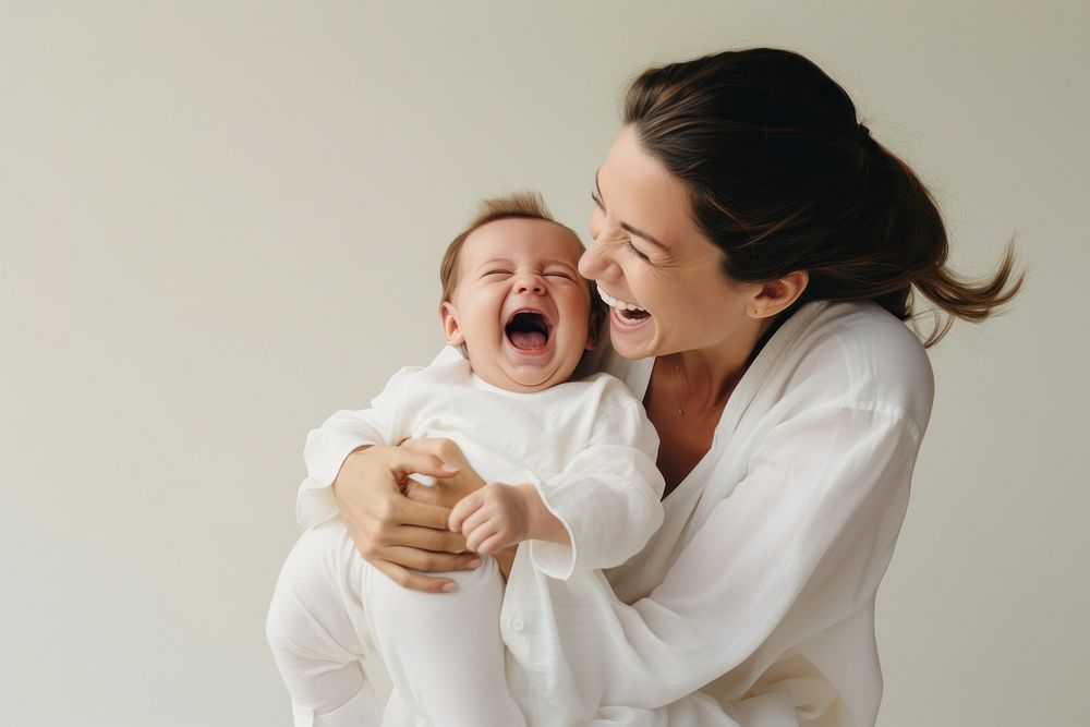 Baby laughing newborn togetherness. AI generated Image by rawpixel.
