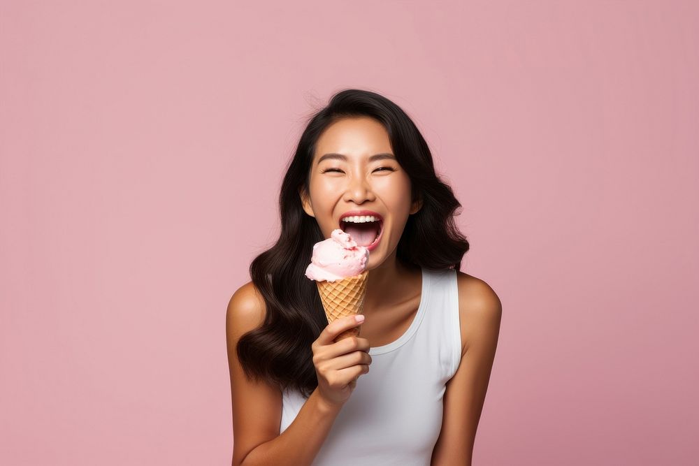 Asian woman licks delicious ice cream dessert eating adult. AI generated Image by rawpixel.