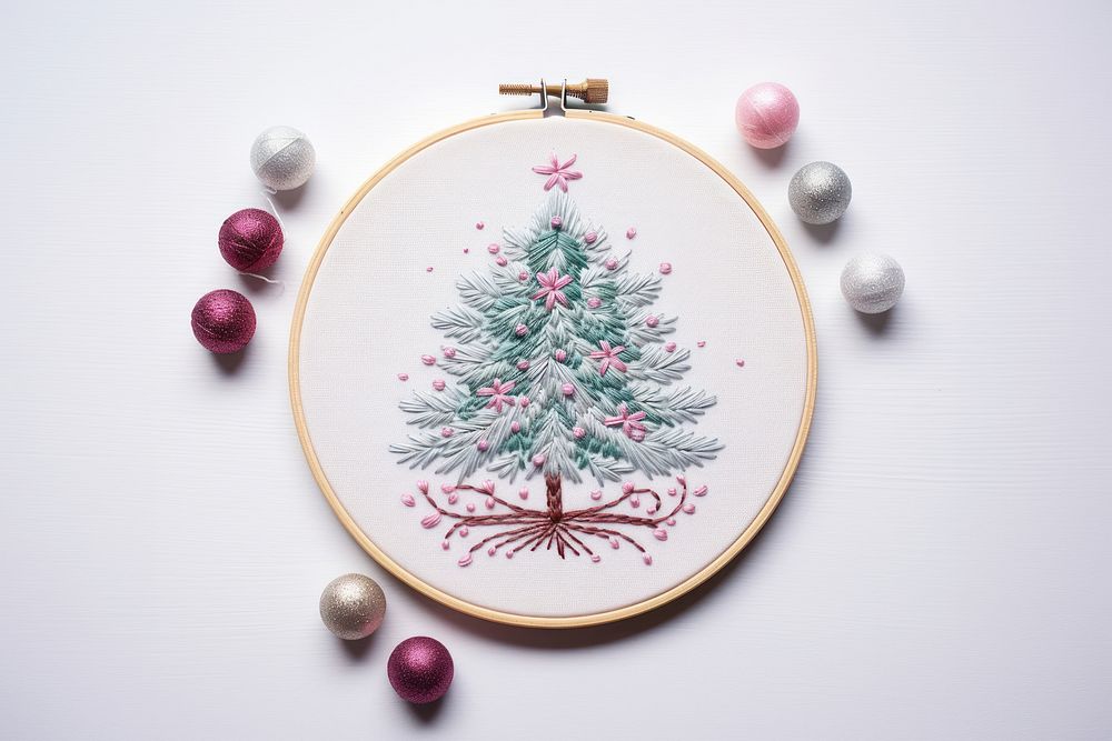 A Christmas gift embroidery christmas pattern representation. AI generated Image by rawpixel.