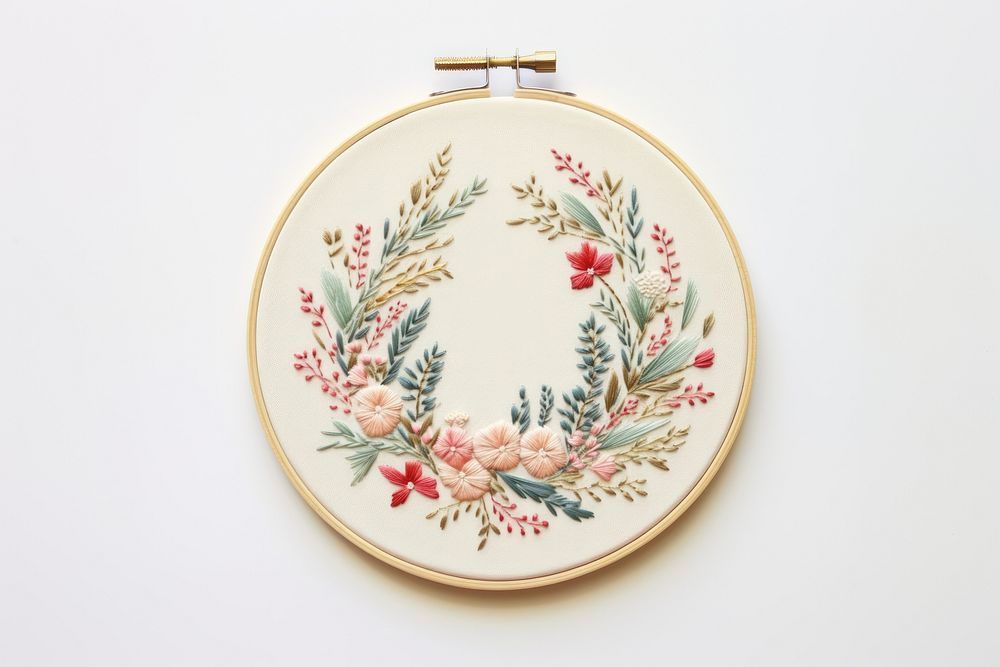 A Christmas wreath embroidery pattern art white background. AI generated Image by rawpixel.