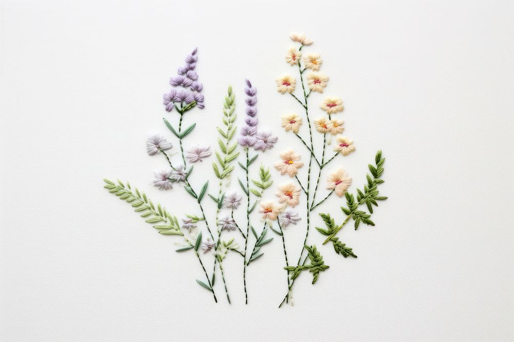 A flower embroidery pattern plant white background. AI generated Image by rawpixel.