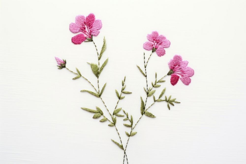 A flower embroidery blossom plant inflorescence. AI generated Image by rawpixel.