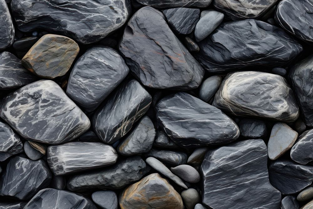 Rock texture pebble backgrounds abundance. AI generated Image by rawpixel.
