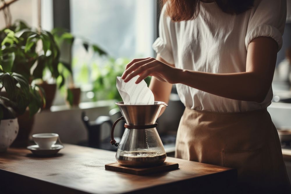 Woman making coffee kitchen adult coffeemaker. AI generated Image by rawpixel.