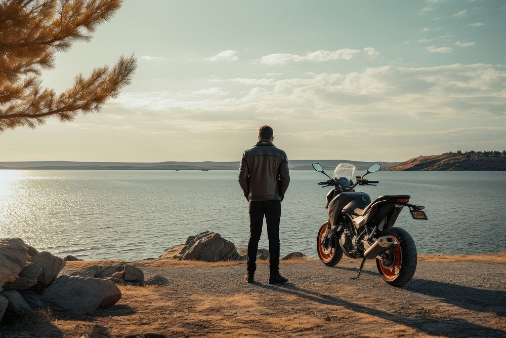 Man on a motorbike motorcycle outdoors standing. AI generated Image by rawpixel.