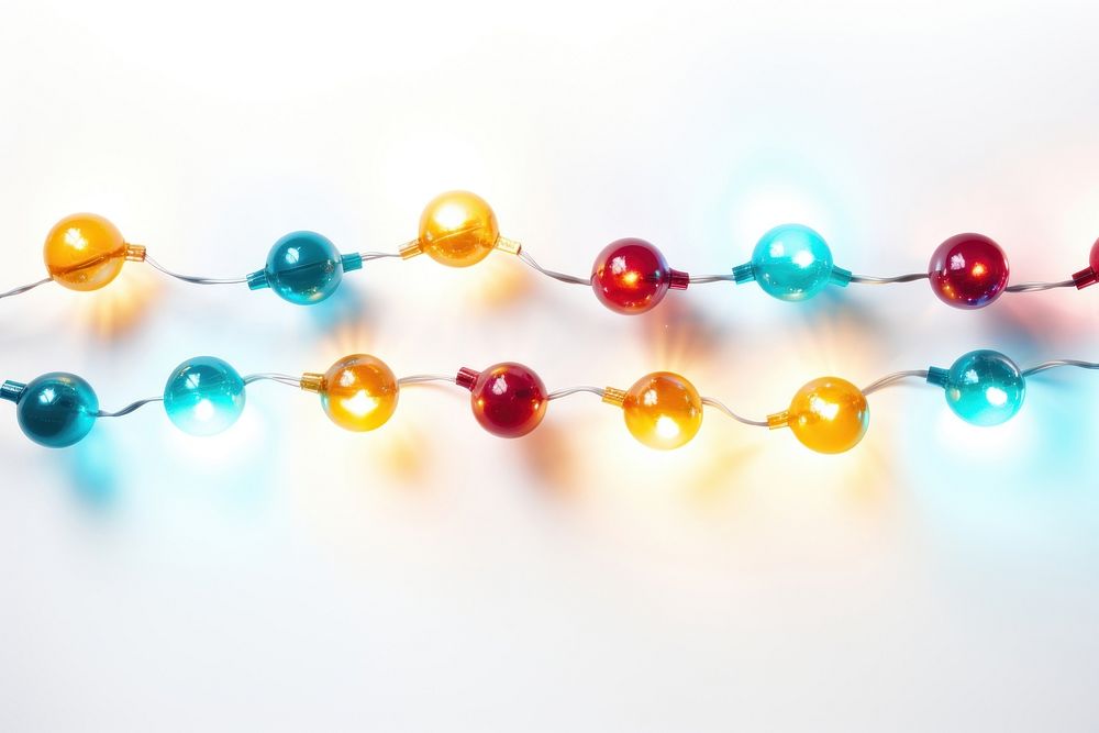 Festive lights jewelry bead illuminated. AI generated Image by rawpixel.