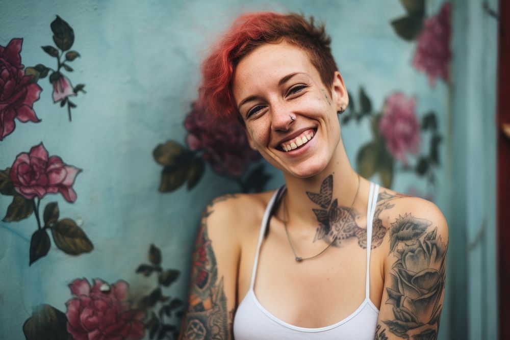 Young woman tattoo portrait laughing. AI generated Image by rawpixel.