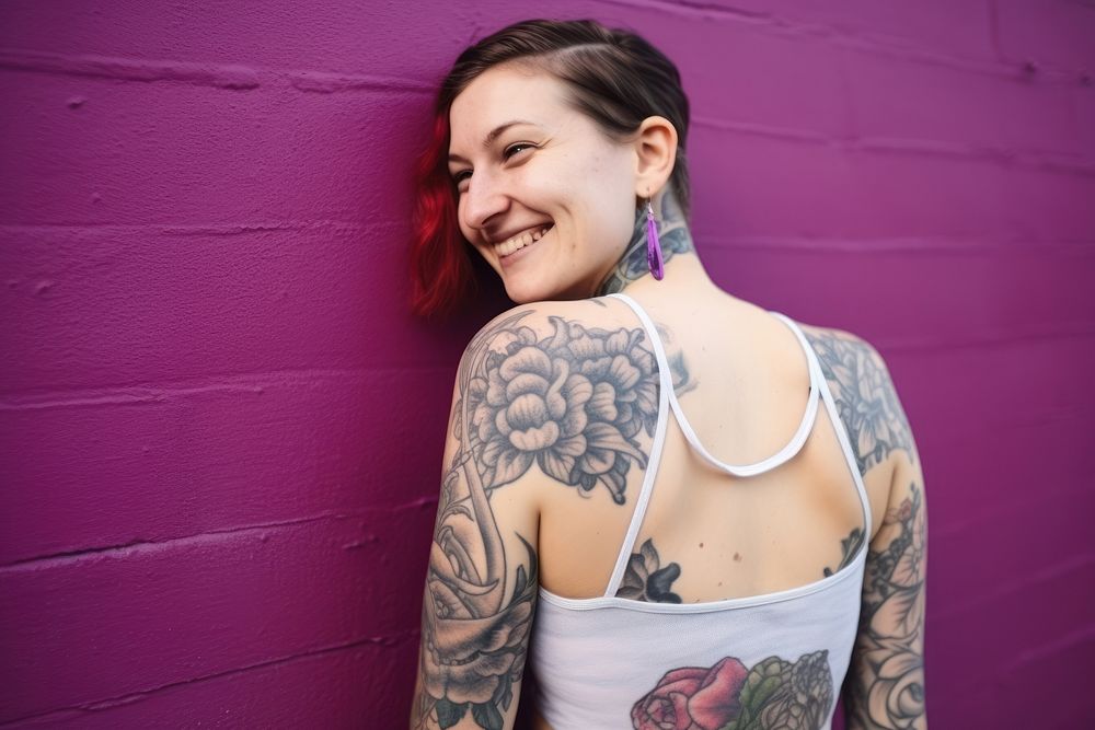Young woman tattoo portrait smiling. AI generated Image by rawpixel.