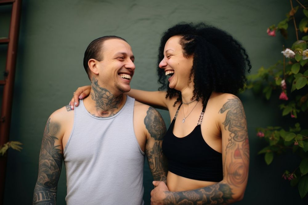 Couple portrait tattoo laughing. AI generated Image by rawpixel.