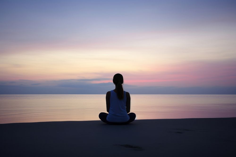 Woman meditating outdoors horizon sitting. AI generated Image by rawpixel.