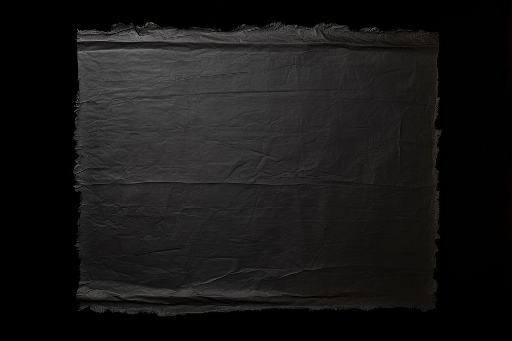 Black backgrounds wrinkled paper. AI generated Image by rawpixel.