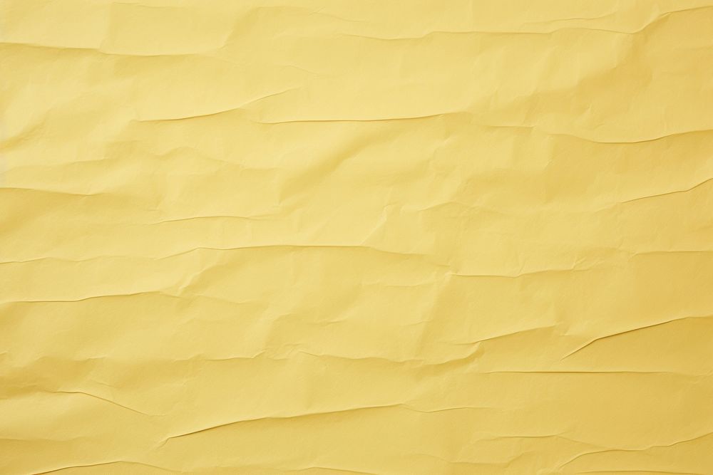 Yellow backgrounds wrinkled paper. AI generated Image by rawpixel.