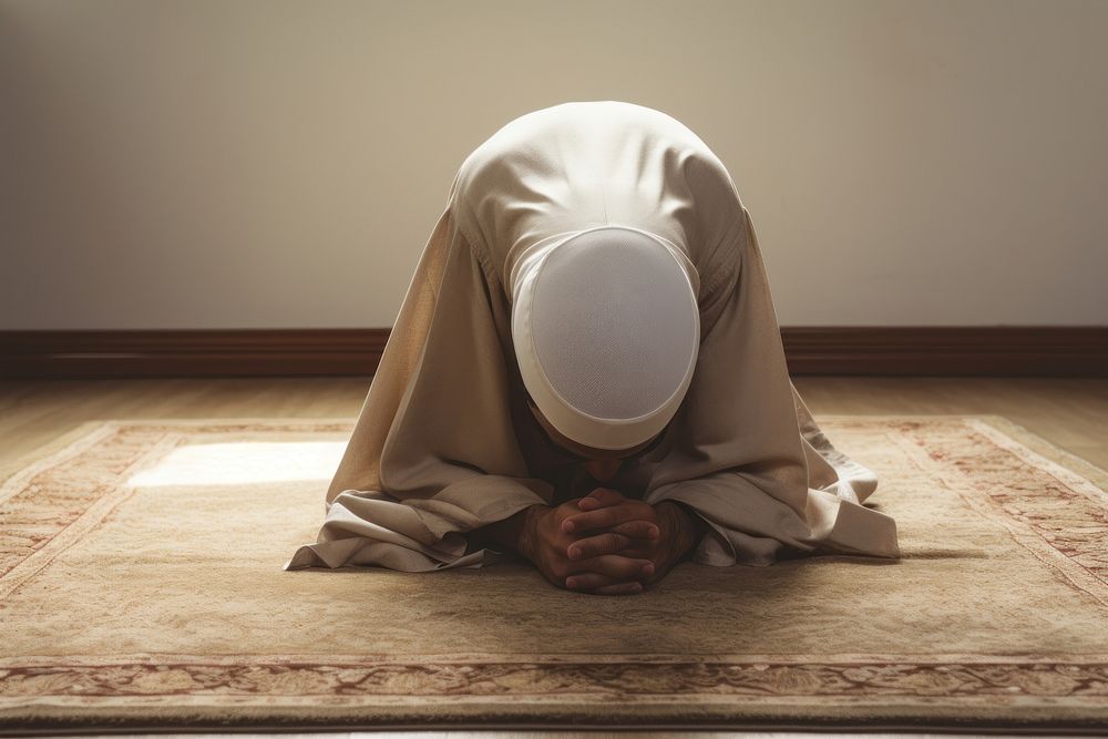 A Muslim man low bowing down spirituality architecture zen-like. AI generated Image by rawpixel.