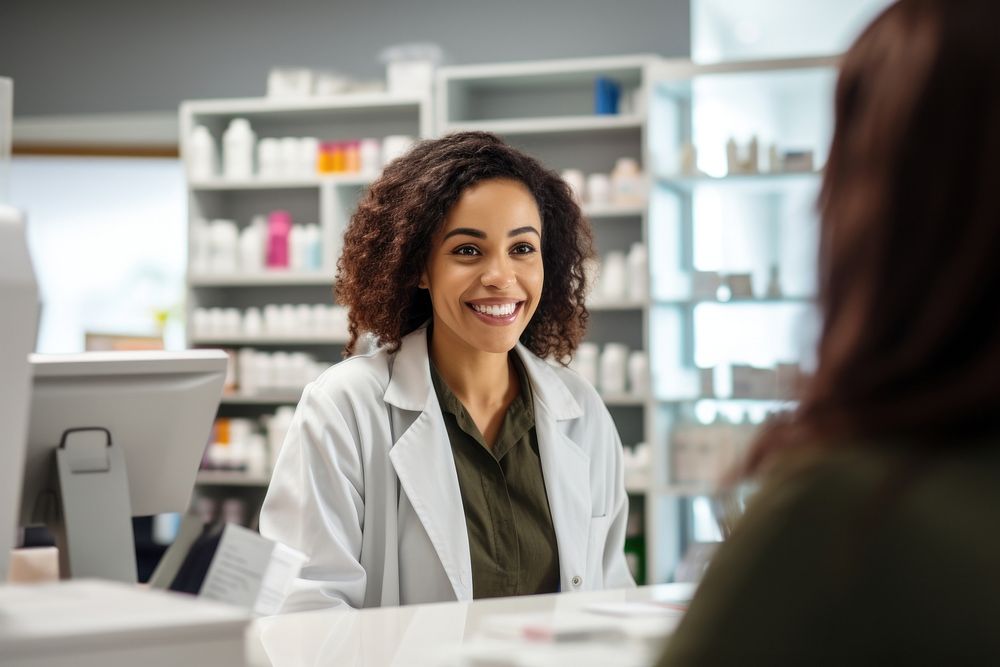 A pharmacist woman customer medicine smiling. AI generated Image by rawpixel.