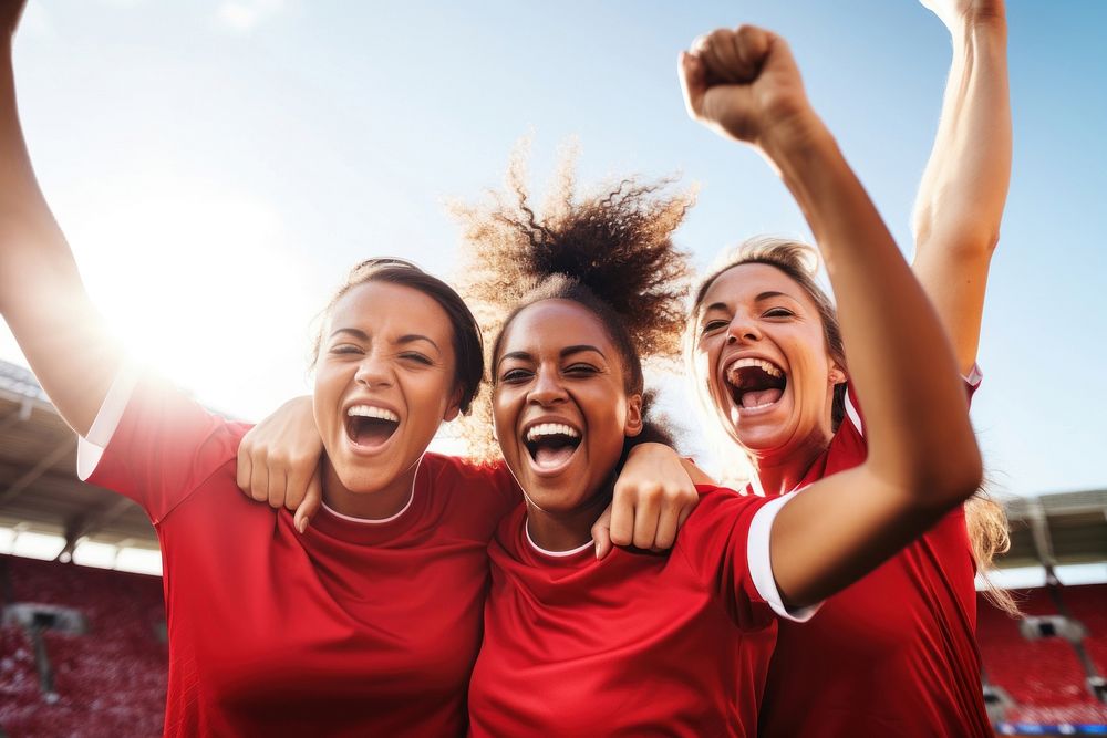 Female soccer players celebrating victory cheerful laughing shouting. AI generated Image by rawpixel.