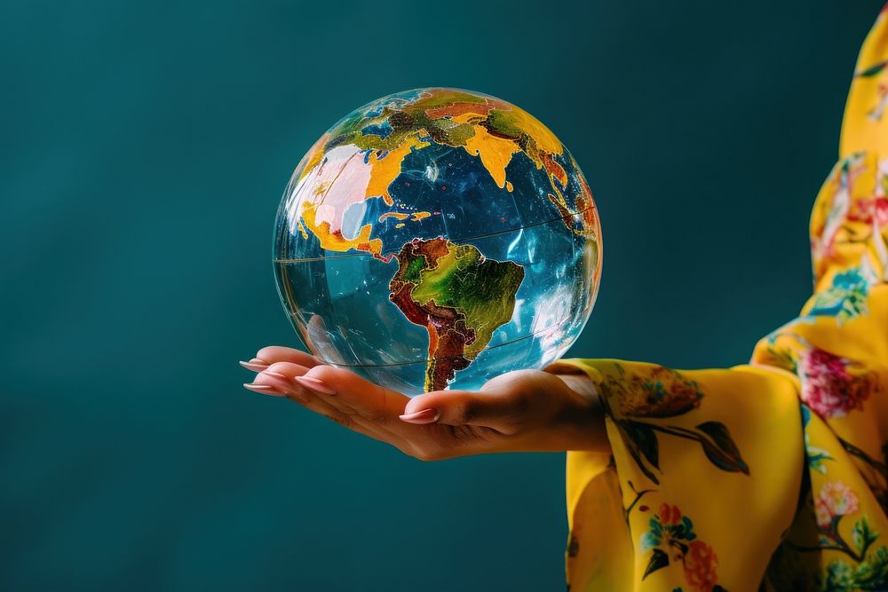 Hand holding globe yellow planet adult. AI generated Image by rawpixel.