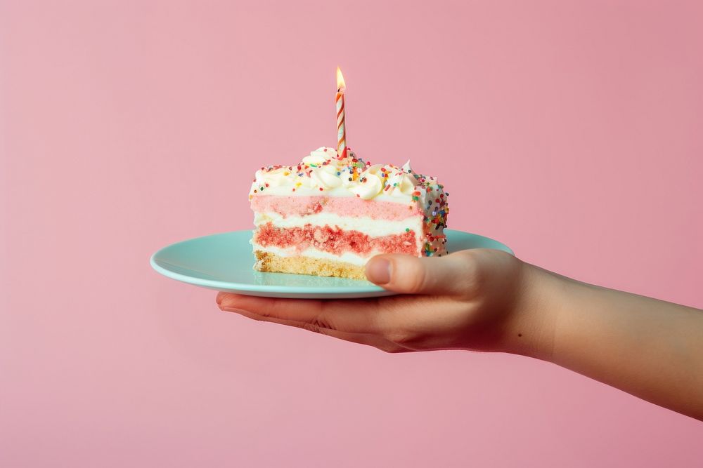 Cake birthday dessert holding. AI generated Image by rawpixel.