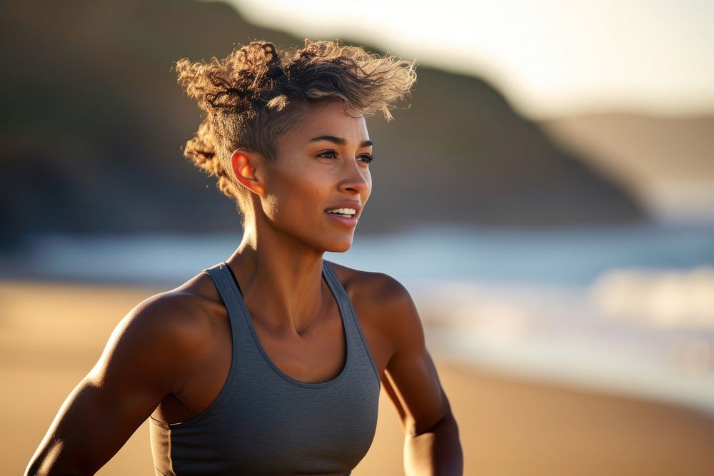 A woman runner running outdoors sports beach. AI generated Image by rawpixel.
