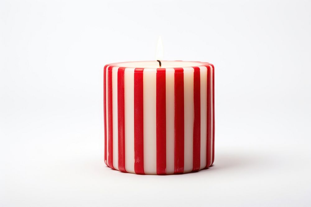 A christmas candle white background lighting cylinder. AI generated Image by rawpixel.