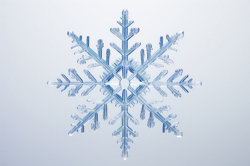 A snowflake backgrounds christmas white. AI generated Image by rawpixel.