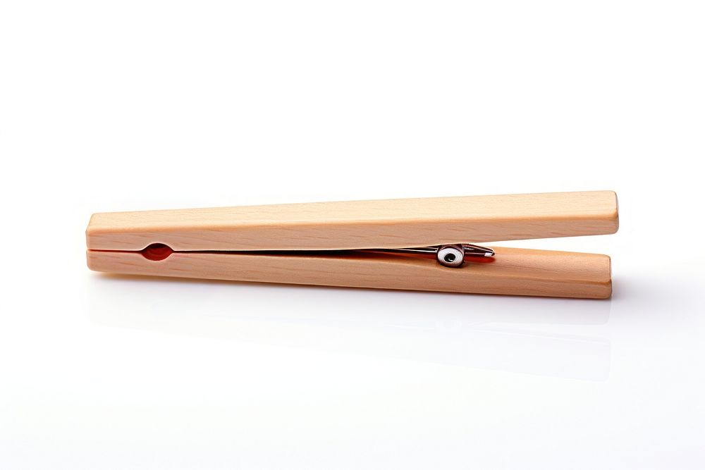 A wooden clothespin white background simplicity cricket. AI generated Image by rawpixel.