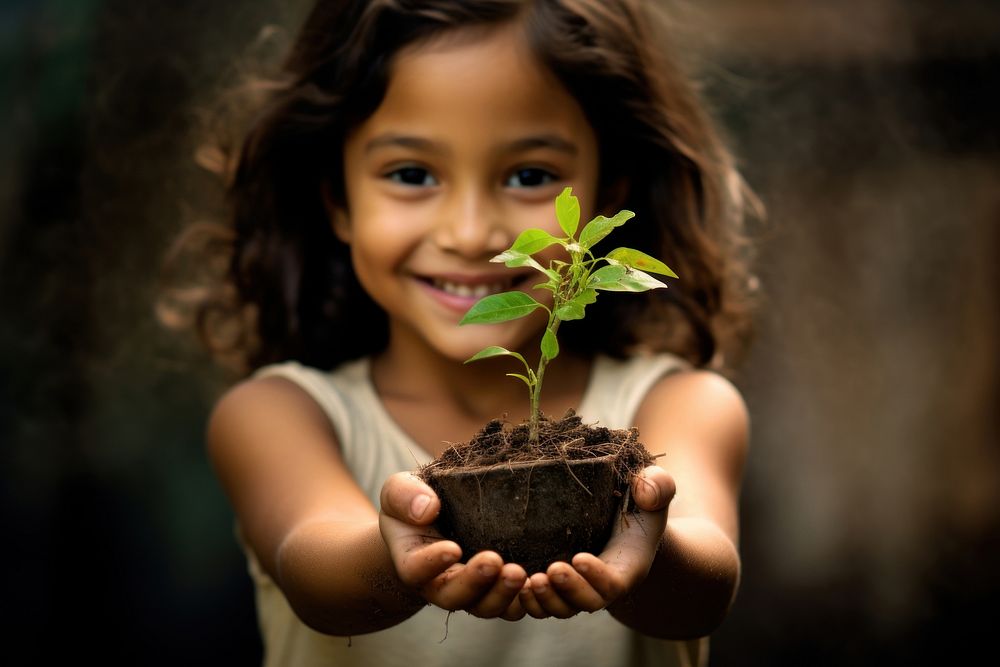 Kid plant planting portrait. AI generated Image by rawpixel.