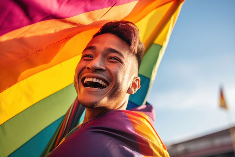 Thai gay man laughing pride smile. AI generated Image by rawpixel.