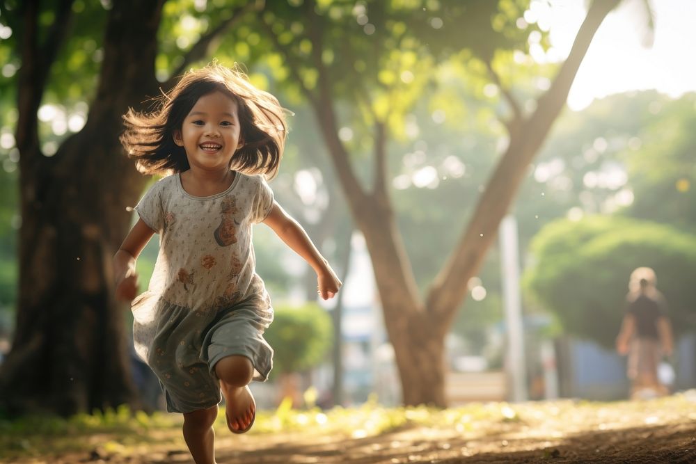 Young little Thai girl child running day. AI generated Image by rawpixel.