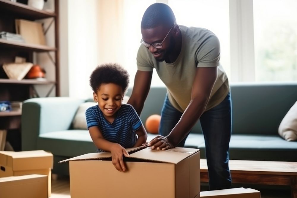 Father and son help pack box father adult. AI generated Image by rawpixel.