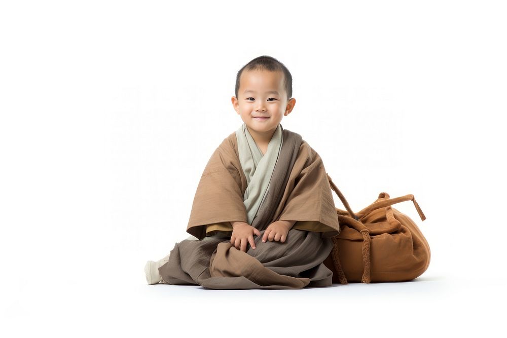 Child sitting robe white background. AI generated Image by rawpixel.