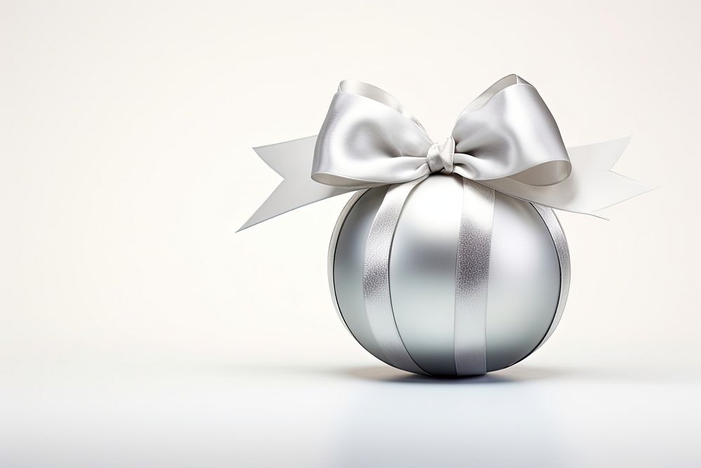 Silver Christmas ball christmas ribbon bow. AI generated Image by rawpixel.