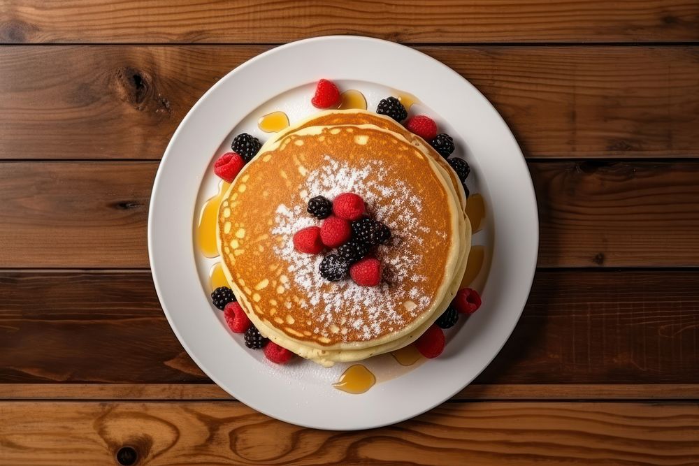 Pancake plate table food. AI generated Image by rawpixel.