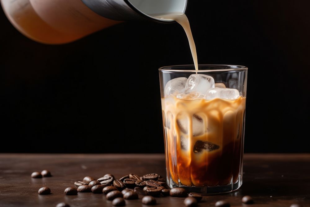 Coffee pouring drink milk. AI generated Image by rawpixel.