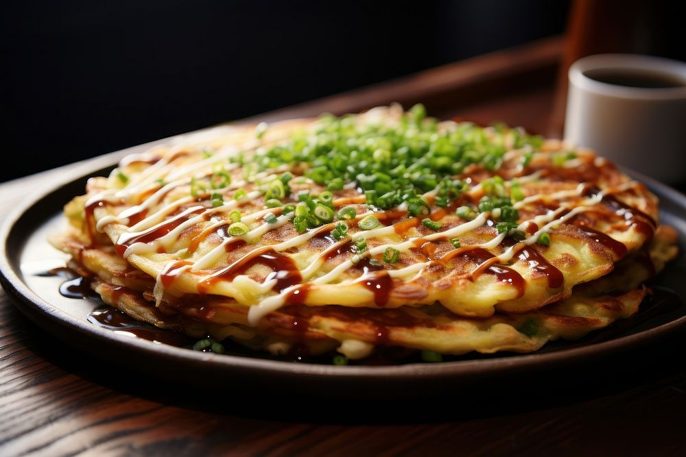 Okonomiyaki plate food restaurant. AI generated Image by rawpixel.