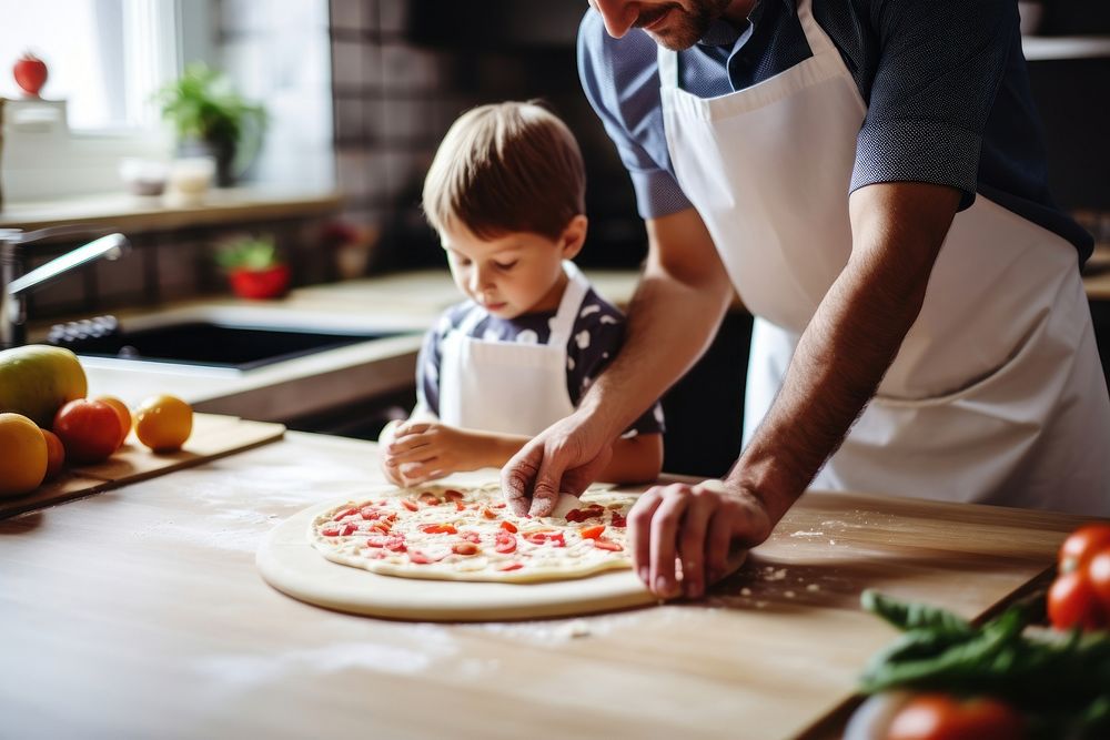 Preparing Pizza pizza cooking kitchen. AI generated Image by rawpixel.