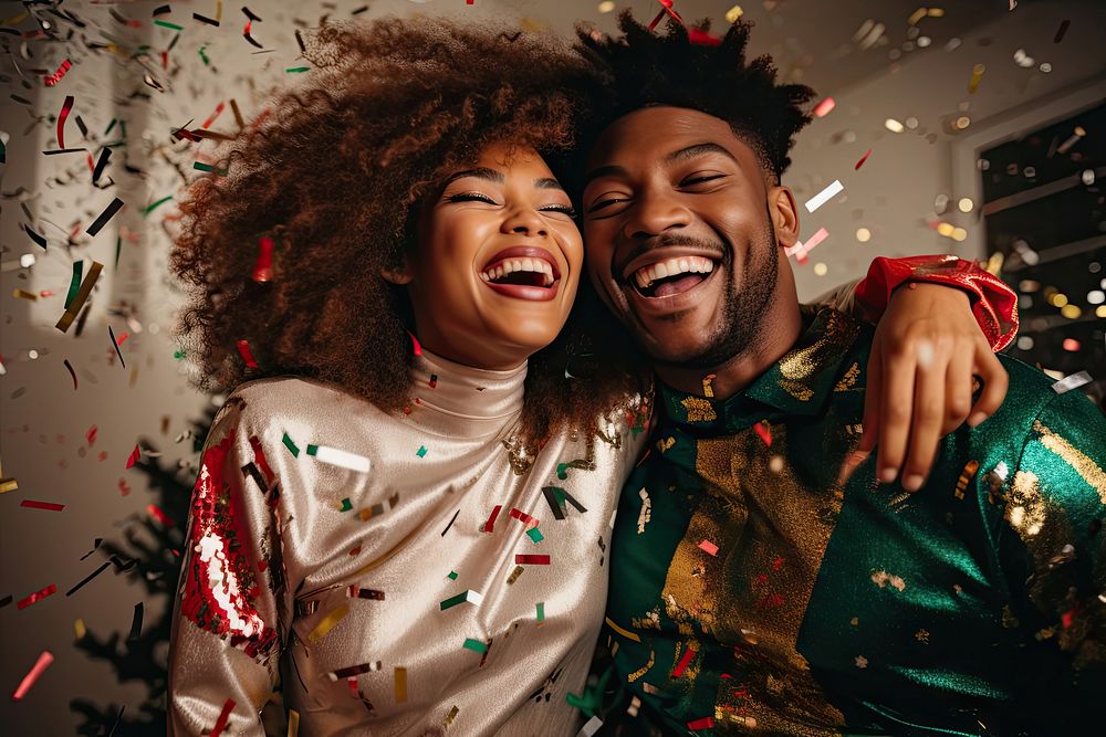 Happy African American couple celebrating christmas confetti. AI generated Image by rawpixel.