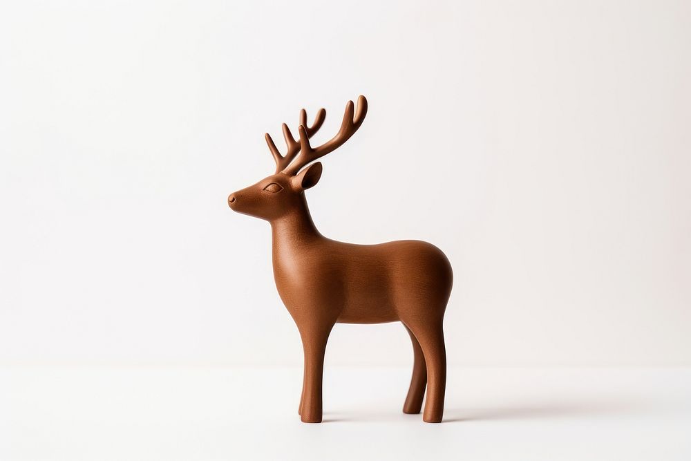Brown ceramic reindeer decoration wildlife antler. AI generated Image by rawpixel.