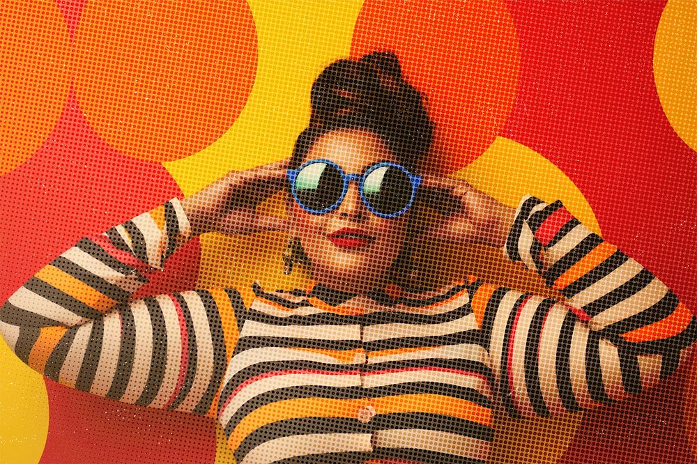 Woman wearing sunglasses photo with retro effect