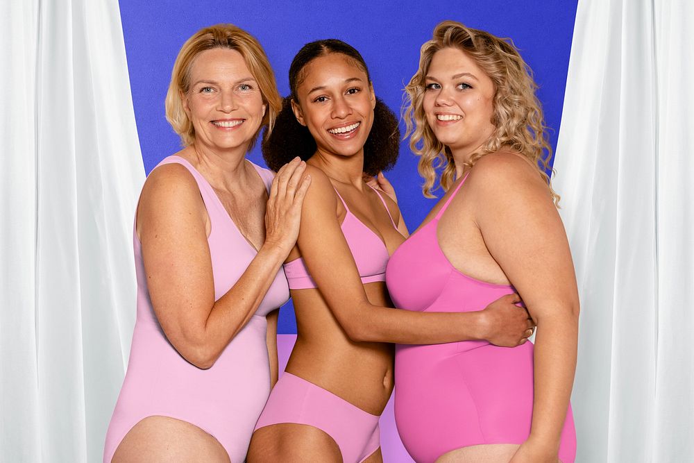 Diverse women in pink swimwear