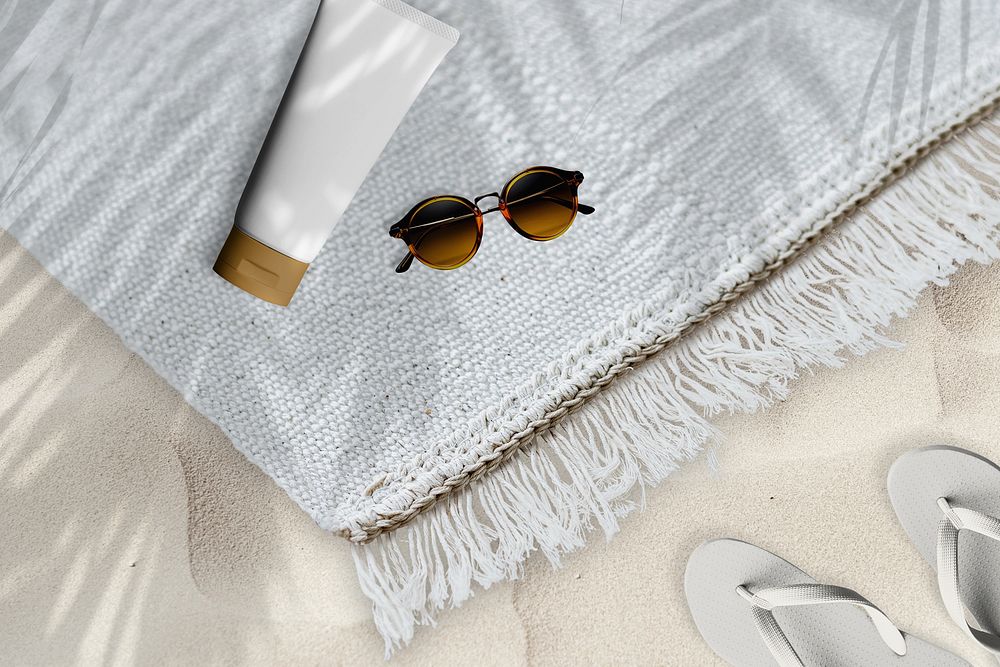 Sunscreen tube on beach towel remix