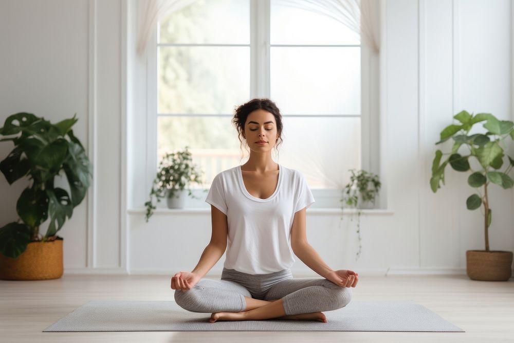 Young woman sitting yoga practicing. AI generated Image by rawpixel.