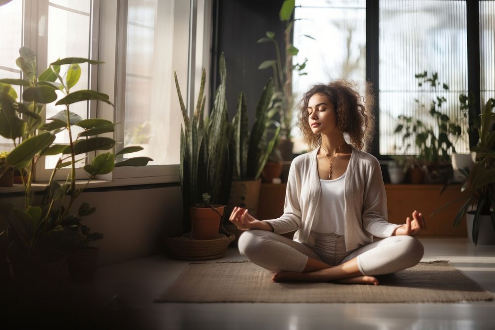 Young woman sitting yoga adult. AI generated Image by rawpixel.