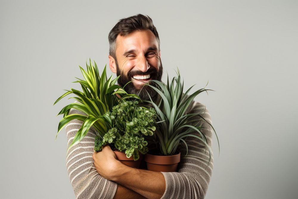 Potted plants smile adult happy. AI generated Image by rawpixel.